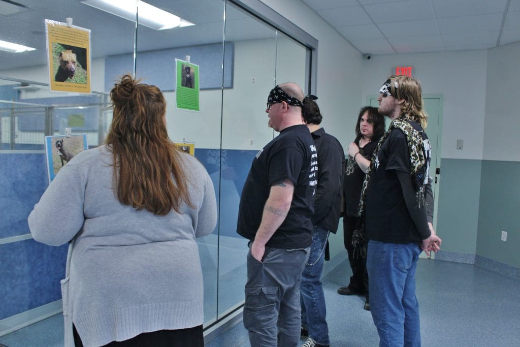 Allison showing guys the dog room at MHHS.